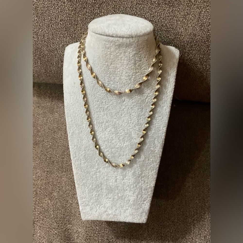 Danecraft: vintage Italian gold tone over 925 silver vermeil twist herringbone.